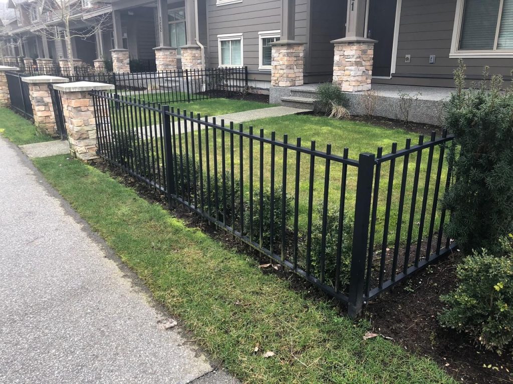 iron fencing in front of the house